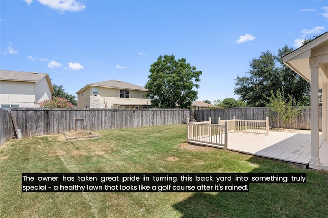 view of yard featuring a wooden deck