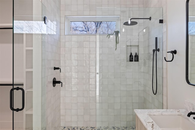 bathroom featuring sink and walk in shower