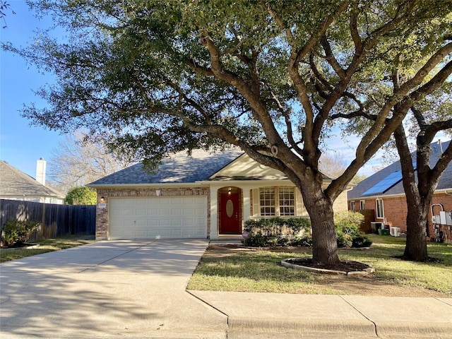 ranch-style home featuring a garage