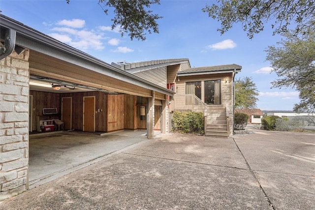 106 Firebird Cv, Lakeway, TX 78734 - view of front of property featuring concrete driveway and an attached garage