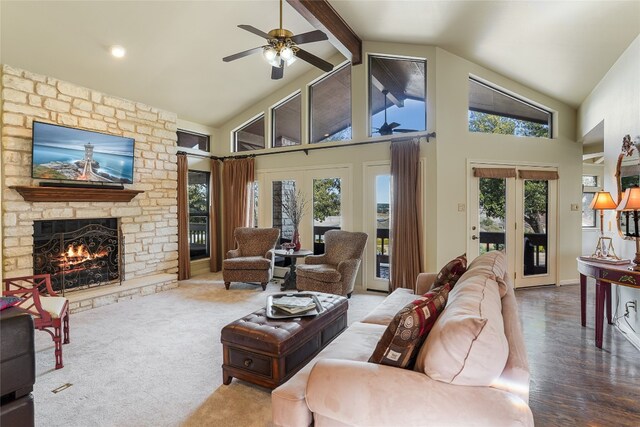 106 Firebird Cv, Lakeway, TX 78734 - living room featuring healthy amount of natural light, a fireplace, high vaulted ceiling, a ceiling fan, and beam ceiling