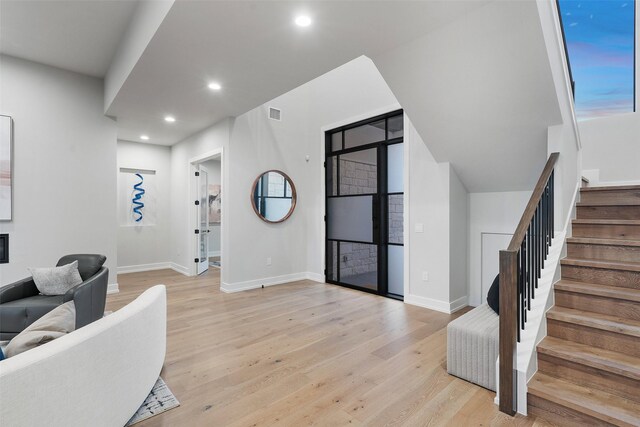 entryway with light wood-type flooring