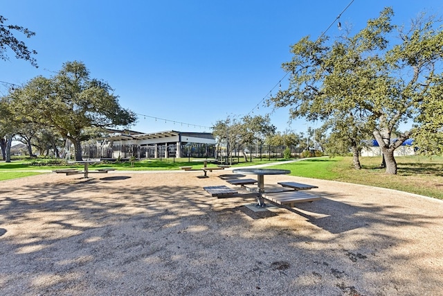 surrounding community featuring a lawn