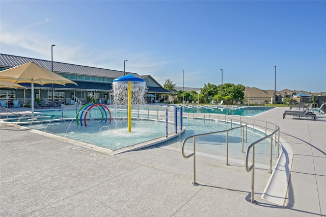 view of pool featuring pool water feature