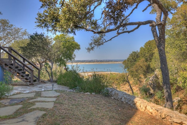 view of yard with a water view