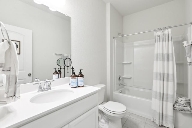 full bathroom with shower / bath combo with shower curtain, toilet, vanity, and tile patterned flooring