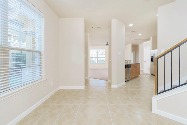 interior space featuring light tile patterned flooring