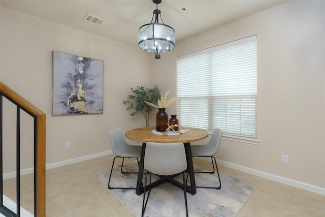 14815 Avery Ranch Blvd Unit 1703, Austin, TX 78717 - dining area with baseboards, a chandelier, visible vents, and light tile patterned floors
