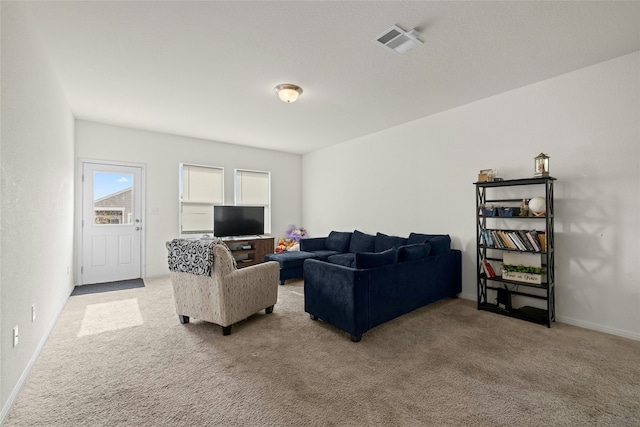 living room with light colored carpet