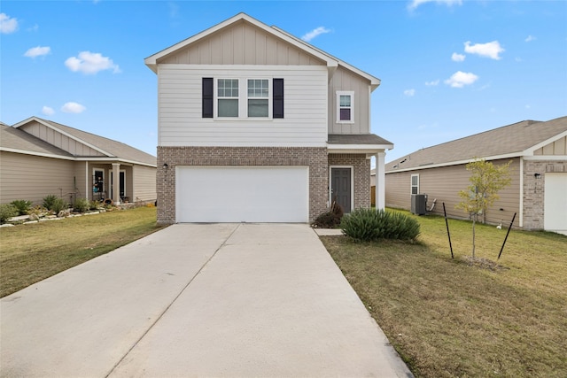 front of property featuring central air condition unit, a front lawn, and a garage