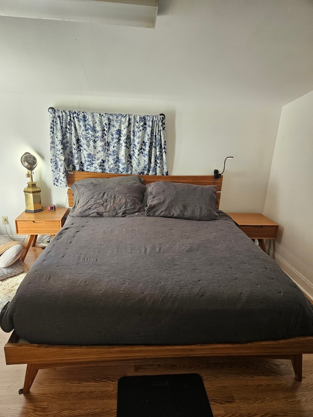 bedroom featuring hardwood / wood-style floors