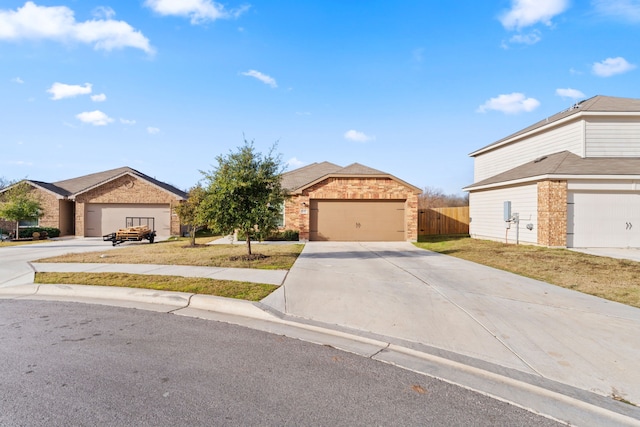 ranch-style house with a garage and a front lawn