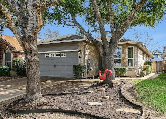 single story home featuring a garage