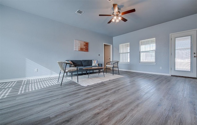 108 Elmer Ave, Burnet, TX 78611 - living room featuring wood finished floors and ceiling fan