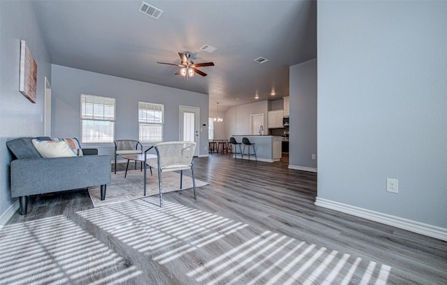 108 Elmer Ave, Burnet, TX 78611 - living room with ceiling fan and wood finished floors
