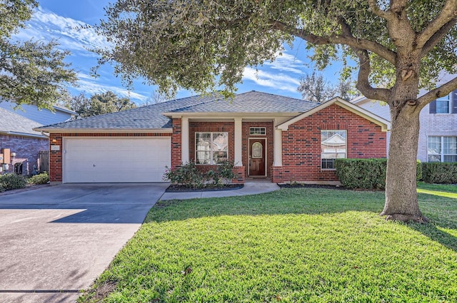 ranch-style home with a garage and a front yard