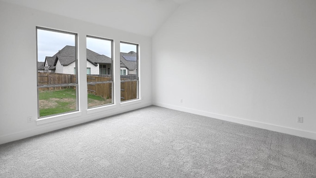 330 Allegheny Way, Kyle, TX 78640 - carpeted empty room featuring vaulted ceiling and baseboards