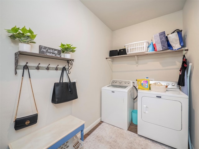 washroom featuring washing machine and dryer