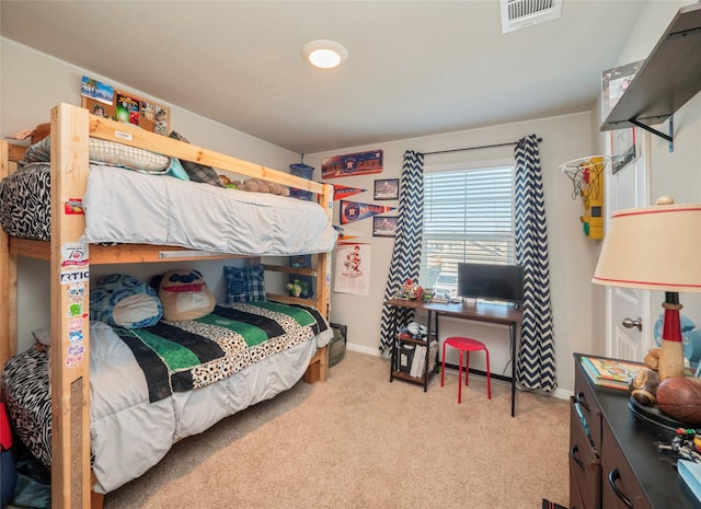 bedroom with light carpet