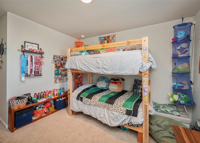 bedroom featuring carpet