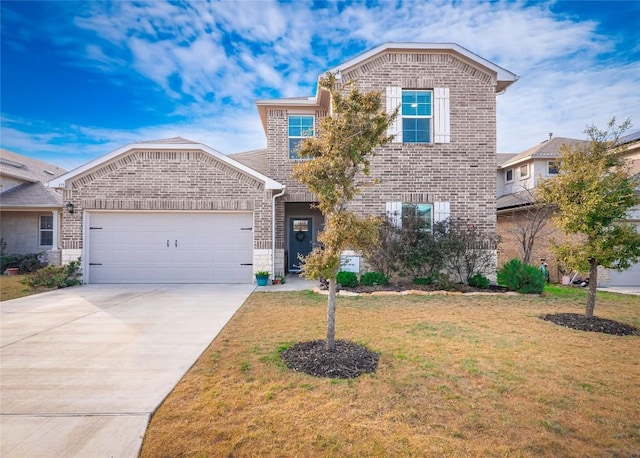 view of property with a garage and a front lawn