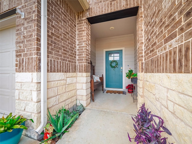 property entrance featuring a garage