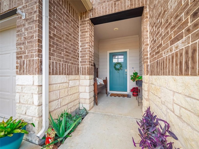 entrance to property with a garage