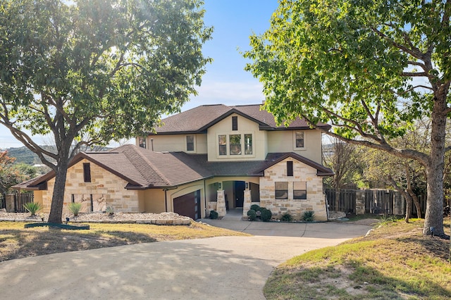 view of front of home with a garage