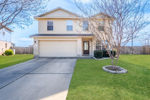 front facade featuring a front yard and a garage