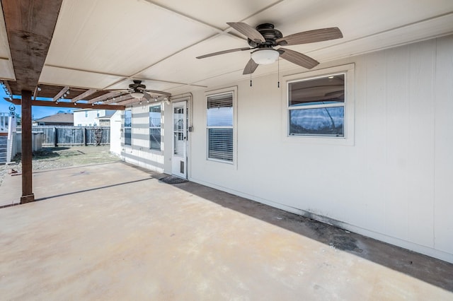 view of patio featuring ceiling fan