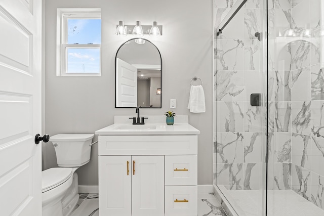 bathroom with a marble finish shower, marble finish floor, toilet, and vanity