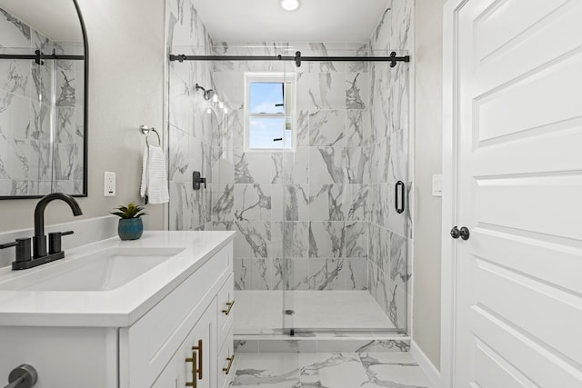 108 Kimo Ct, Bastrop, TX 78602 - bathroom featuring marble look tile flooring, vanity, a marble finish shower, and baseboards