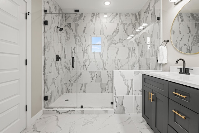 bathroom with recessed lighting, vanity, marble finish floor, and a shower stall