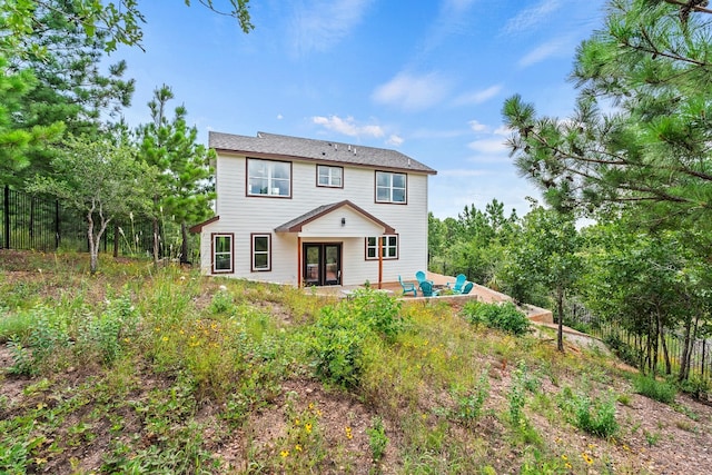 108 Kimo Ct, Bastrop, TX 78602 - rear view of property featuring a patio