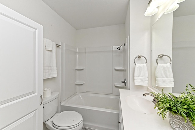 full bathroom featuring toilet, tub / shower combination, and vanity