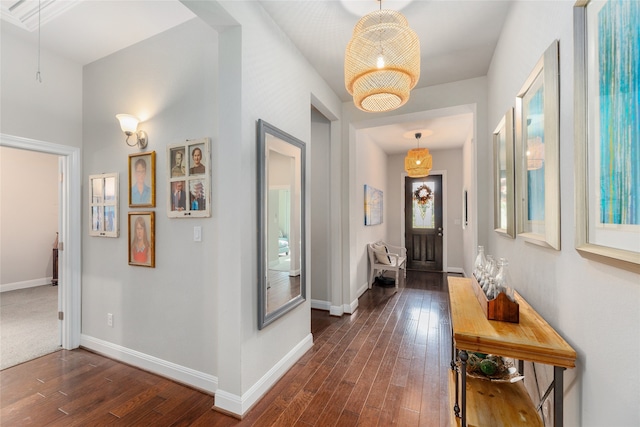 hallway with dark wood-type flooring