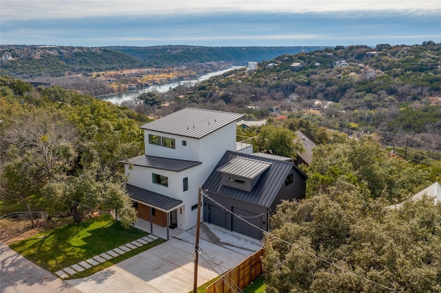 birds eye view of property featuring a water view