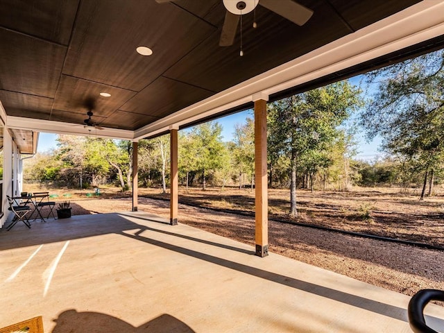 view of patio featuring ceiling fan