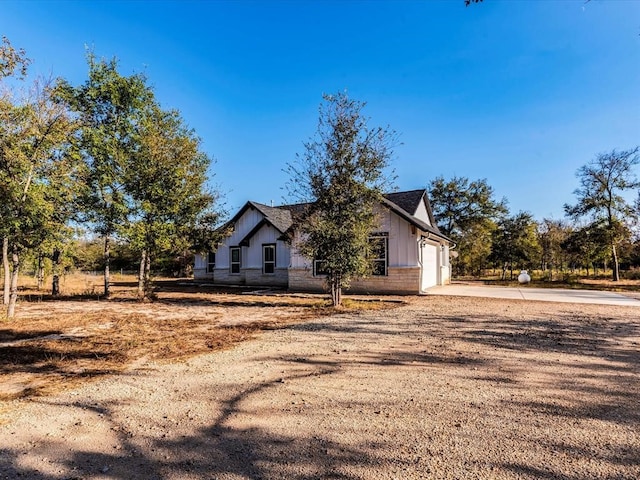 view of property exterior with a garage