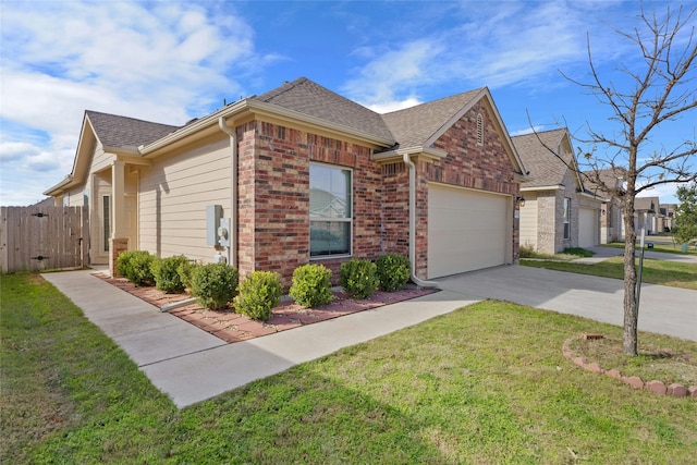 view of front of house with a front lawn and a garage