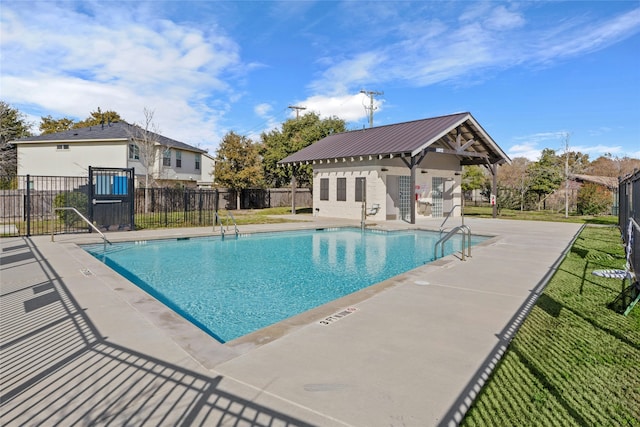 view of swimming pool featuring a patio