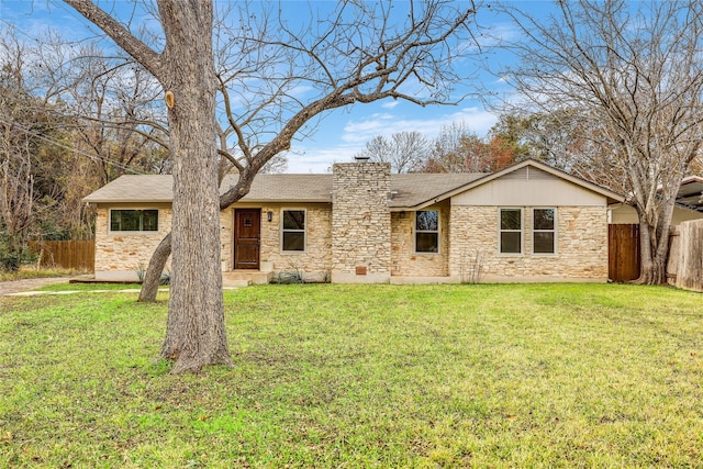 ranch-style house with a front lawn