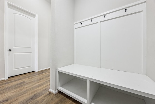 mudroom with wood-type flooring