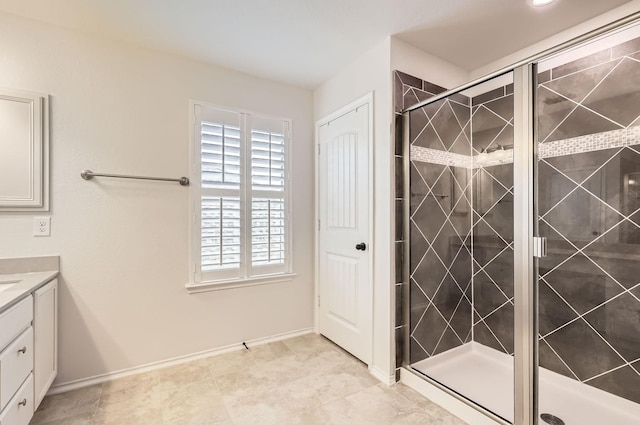 bathroom with vanity and an enclosed shower