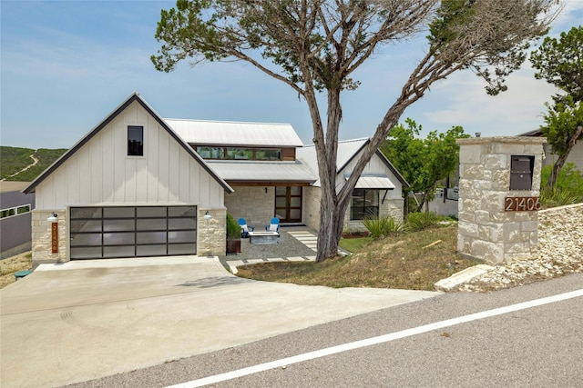 view of front of property with a garage