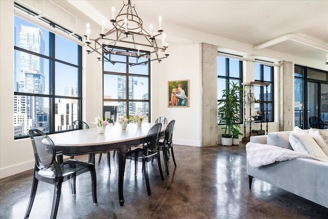 dining space with a notable chandelier