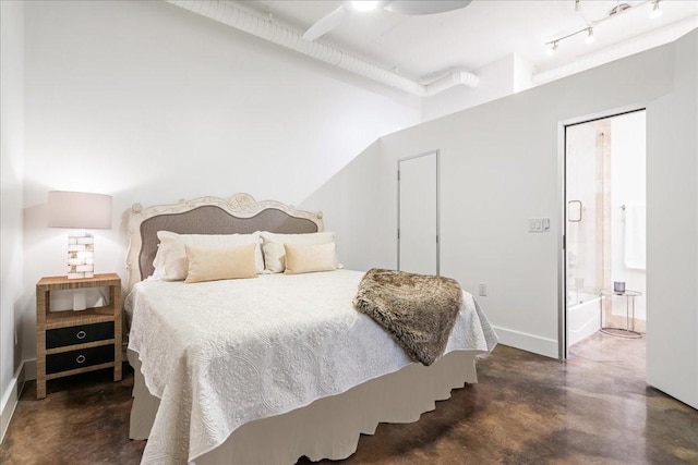 bedroom with ceiling fan and ensuite bathroom