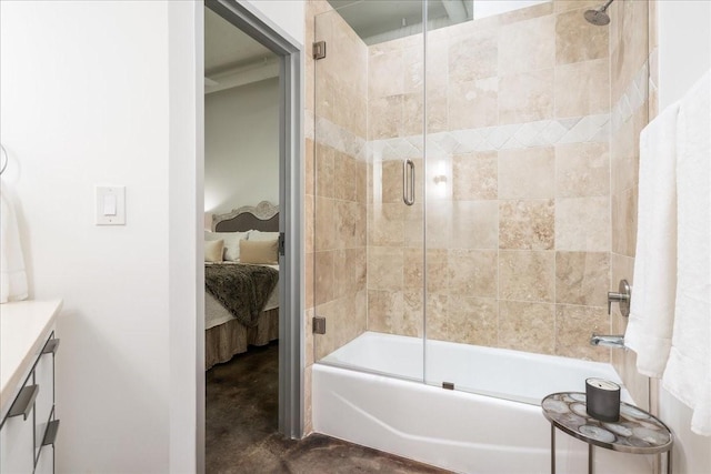 bathroom with vanity and enclosed tub / shower combo