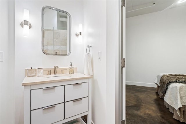 bathroom featuring concrete floors and vanity