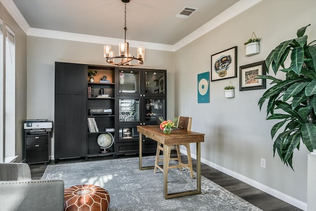 office space featuring dark wood-type flooring, an inviting chandelier, and crown molding